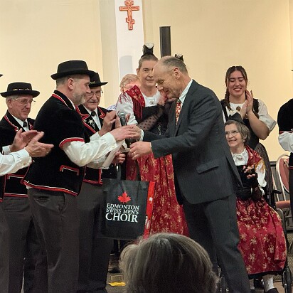 President Hans Vögeli brings best wishes from the Edmonton Men's Choir